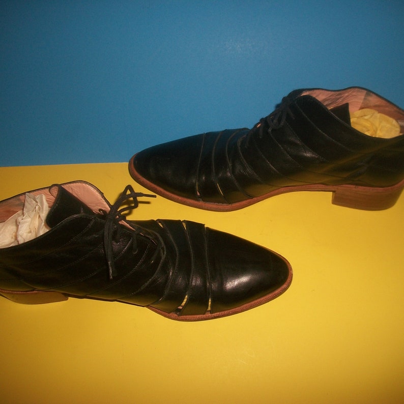 Robert Clergerie Black-leather Oxfords With Slanted Top &
